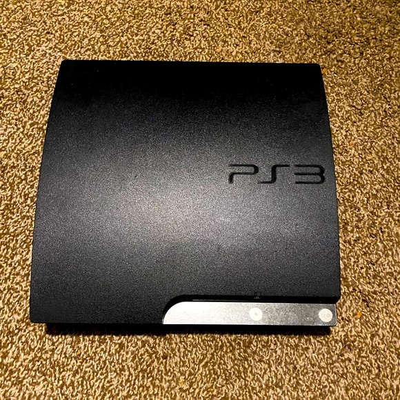 PlayStation 3 Slim with 2 controllers.